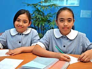 Mill Park primary sisters studying high school subjects