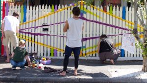 Port Melbourne: Rainbow fence owner defies council with artistic flair