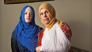 Muslim woman suffers broken arm in racist attack
