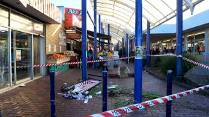Lalor bakery smash: Four hurt as car backs into seating