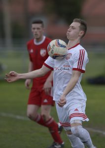 Whittlesea United ices the birthday cake