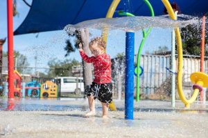 Water play splash pad cools down summer