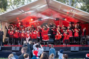 Christmas Carols Choir opens its doors and mouthes