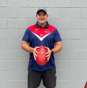 Demons lock in new coach