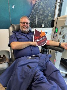 CFA volunteer helping others