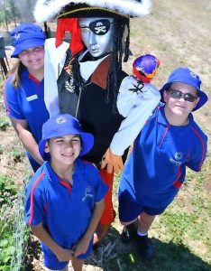 Scarecrows set up to scare off garden vandals