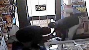 One bandit still at large after milk bar arrest