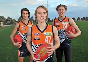 Young footballers embrace a wheel opportunity